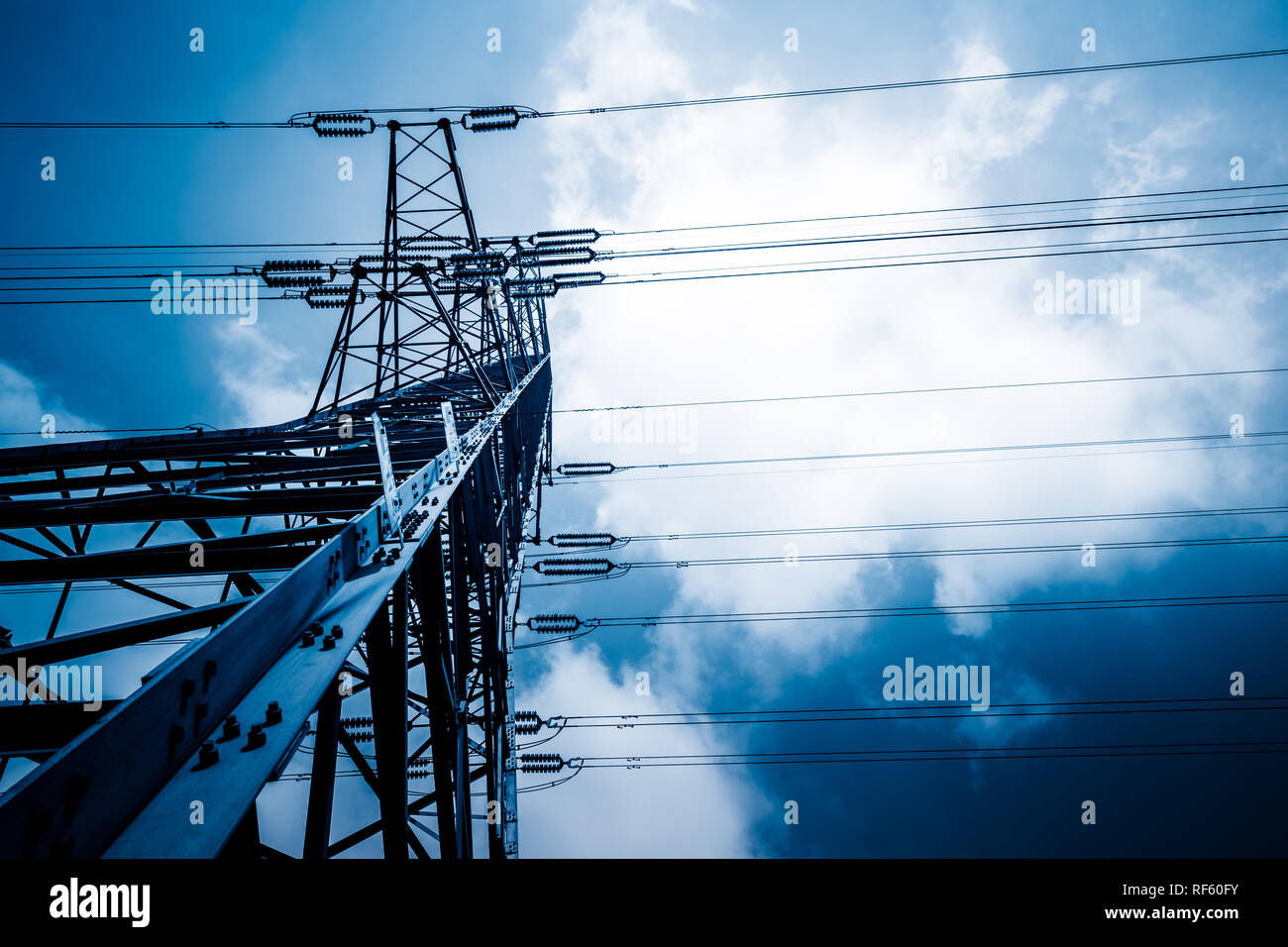 High voltage towers with sky background Stock Photo - Alamy