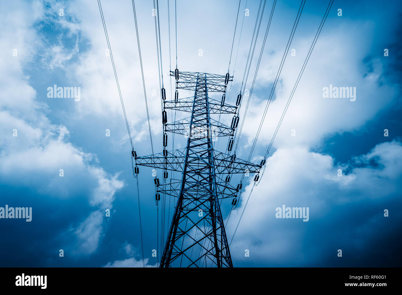 High voltage towers with sky background Stock Photo - Alamy