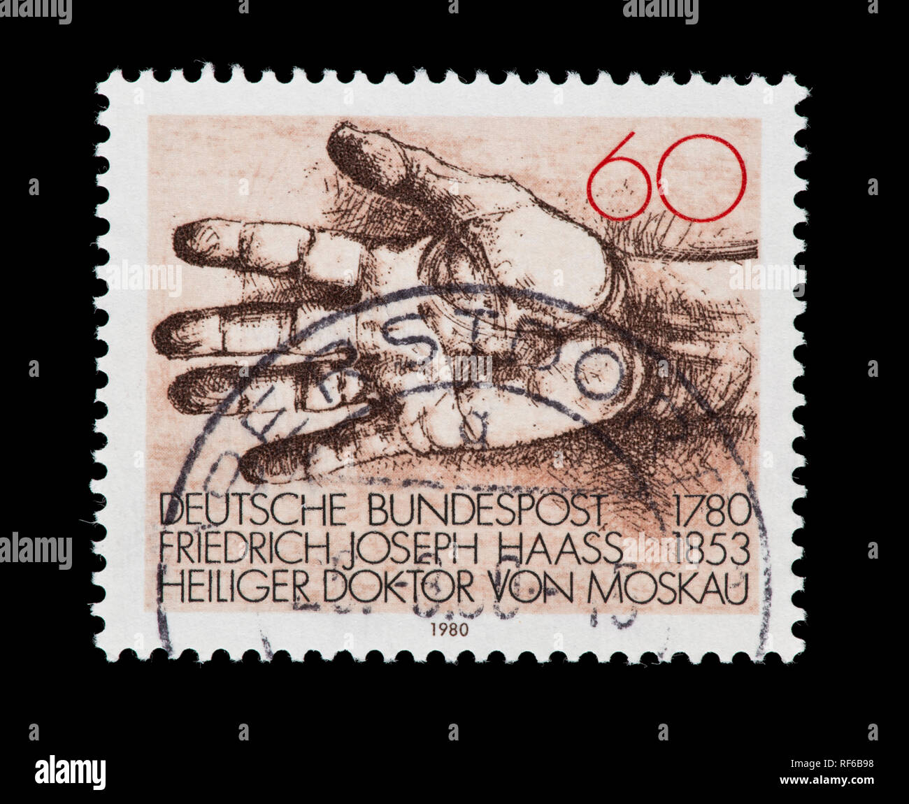 Postage stamp from Germany depicting a helping hand, bicentennial of the birth of Dr. Friedrich Joseph Haass, physician and philanthropist Stock Photo