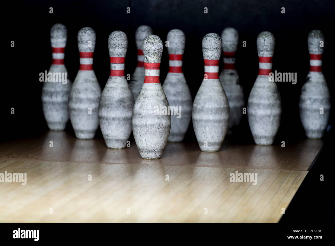 Ten pin bowling alley background. Closeup of tenpin row on a lane