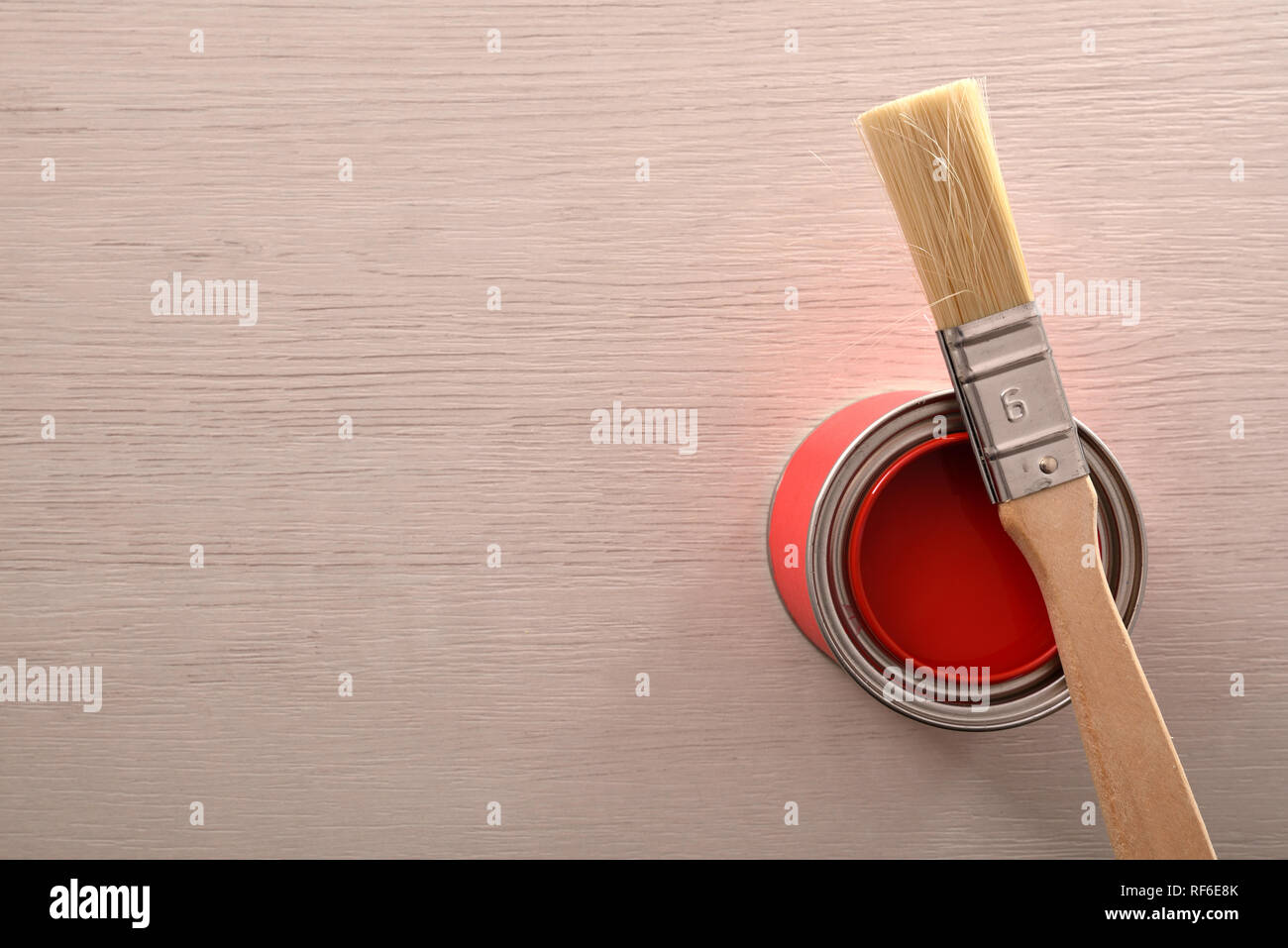 An Open Tin Can with Spilled Red Paint and a Brush by Makstorm10000