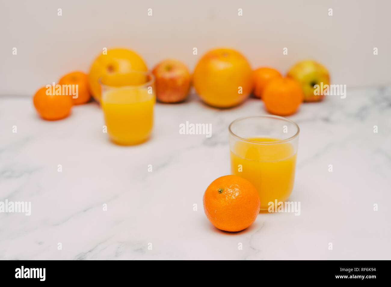 healthy fruit including oranges grapefruits and apples scattered on