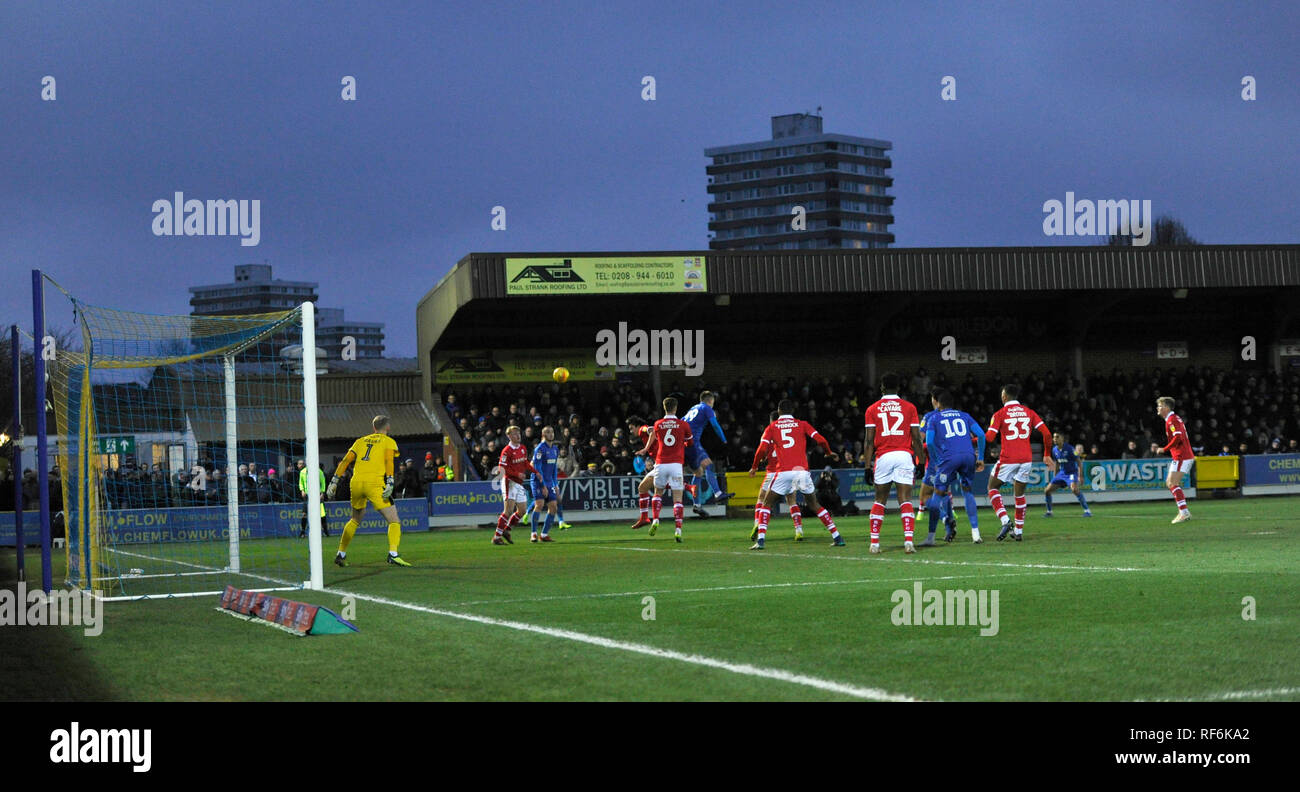 Goalmouth action from the League One match between  AFC Wimbledon and Barnsley at the Cherry Red Records Stadium . 19 January 2019 Editorial use only. No merchandising. For Football images FA and Premier League restrictions apply inc. no internet/mobile usage without FAPL license - for details contact Football Dataco Stock Photo