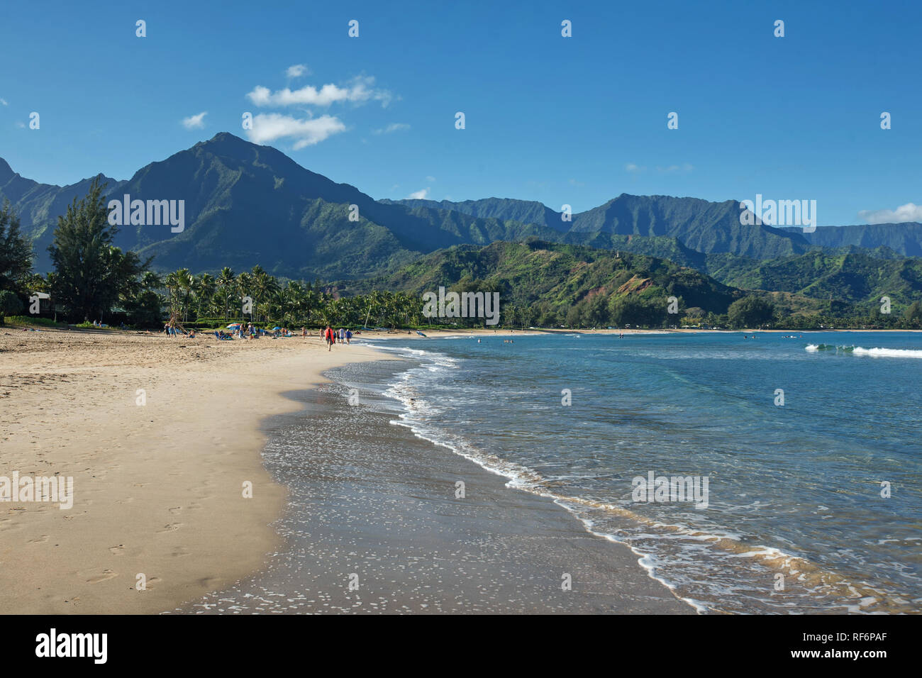 Beachgoers at Hanalei Bay, Kauai Stock Photo - Alamy