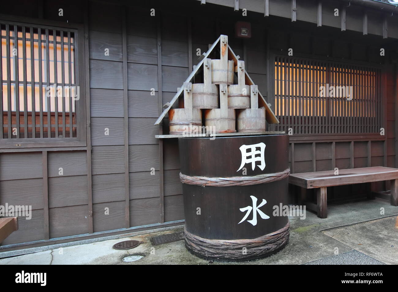 Traditional Japanese wooden water tank at Okage yokocho Ise city Japan. Translation for Japanese