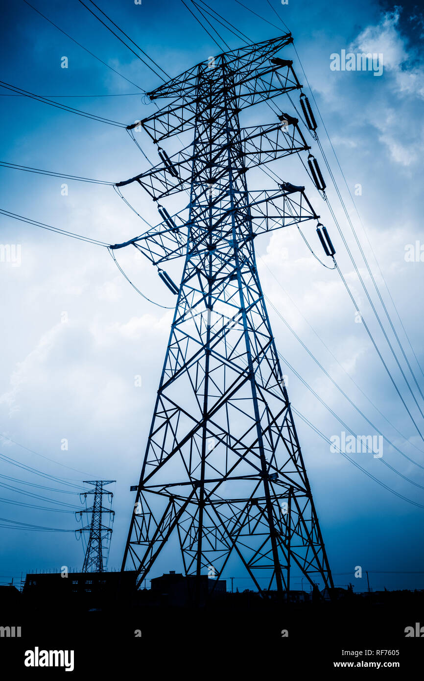 High voltage towers with sky background Stock Photo - Alamy