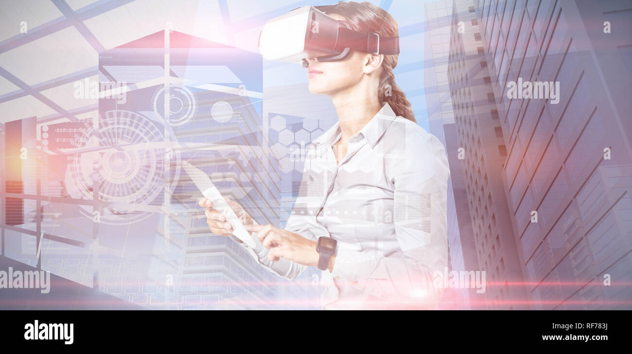 Composite image of female executive using virtual reality headset Stock Photo