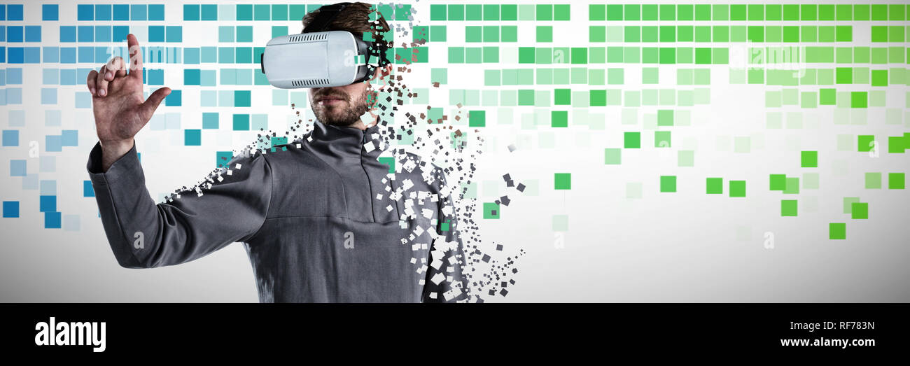Composite image of man gesturing while using virtual reality headset Stock Photo