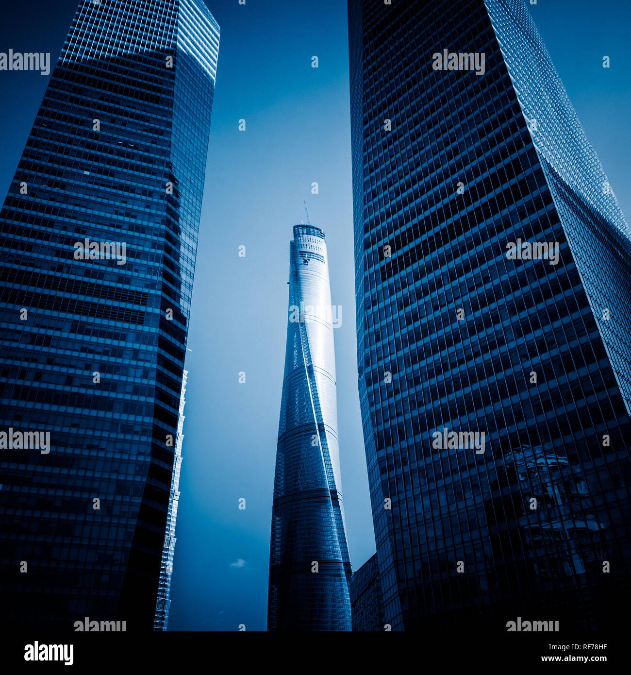 facade of modern office building, blue toned images Stock Photo - Alamy