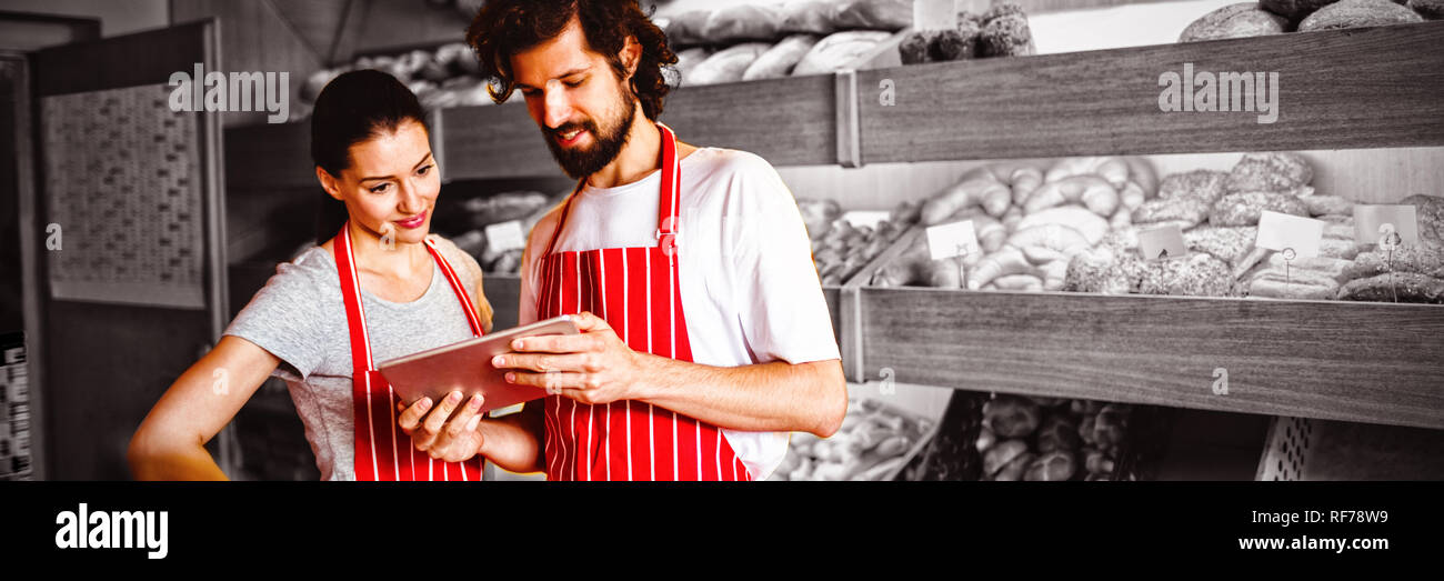 Couple using digital tablet Stock Photo