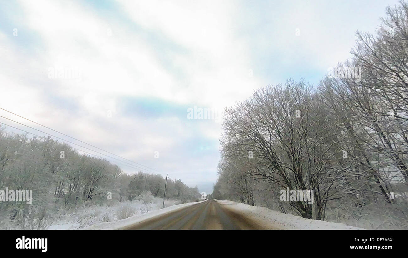 Country road in winter along the forest with white snow trees Stock ...