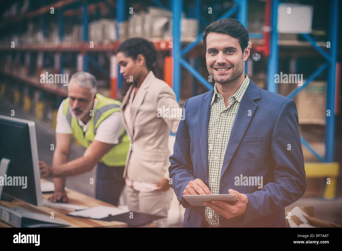 Portrait of manager using digital table Stock Photo