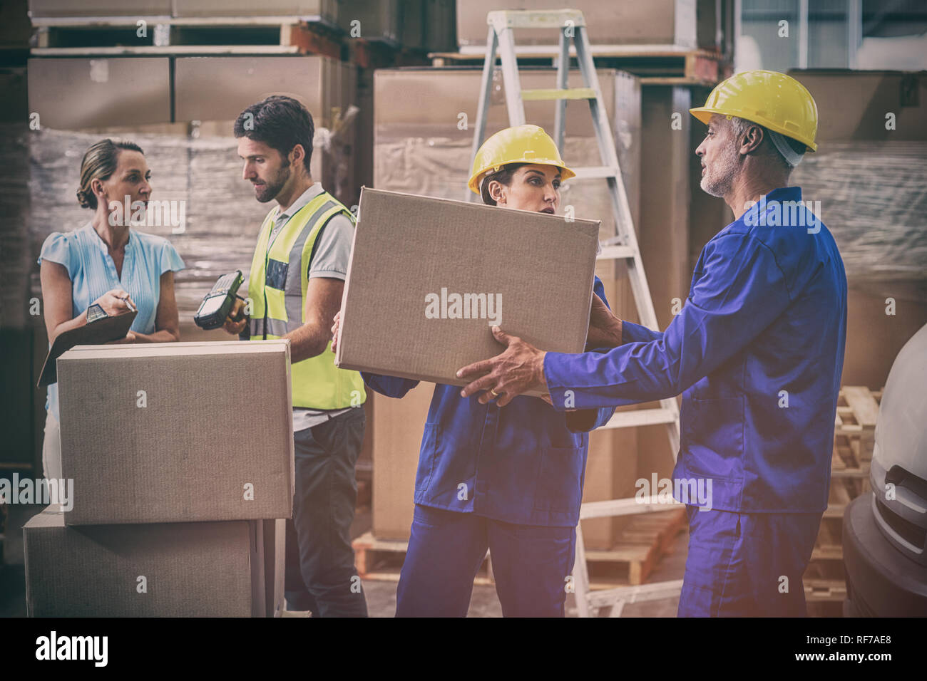 Coworkers looking at each other Stock Photo