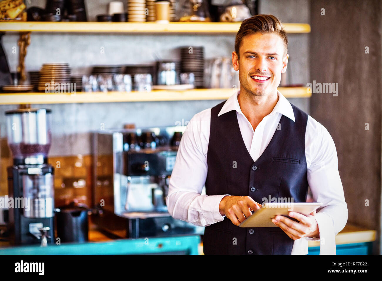 Waiter uniform hi-res stock photography and images - Alamy