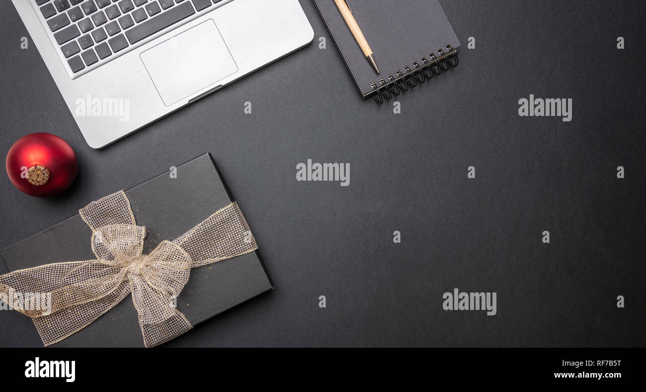 Christmas At Work Black Gift Box With Shiny Ribbon And Computer