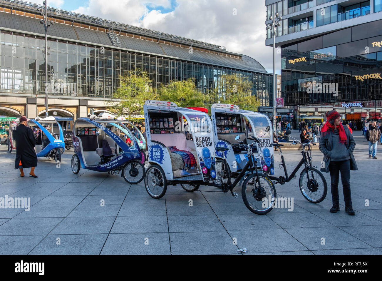 Berlin, Mitte. Bicycle, pedalpowered rickshaws parked outside the