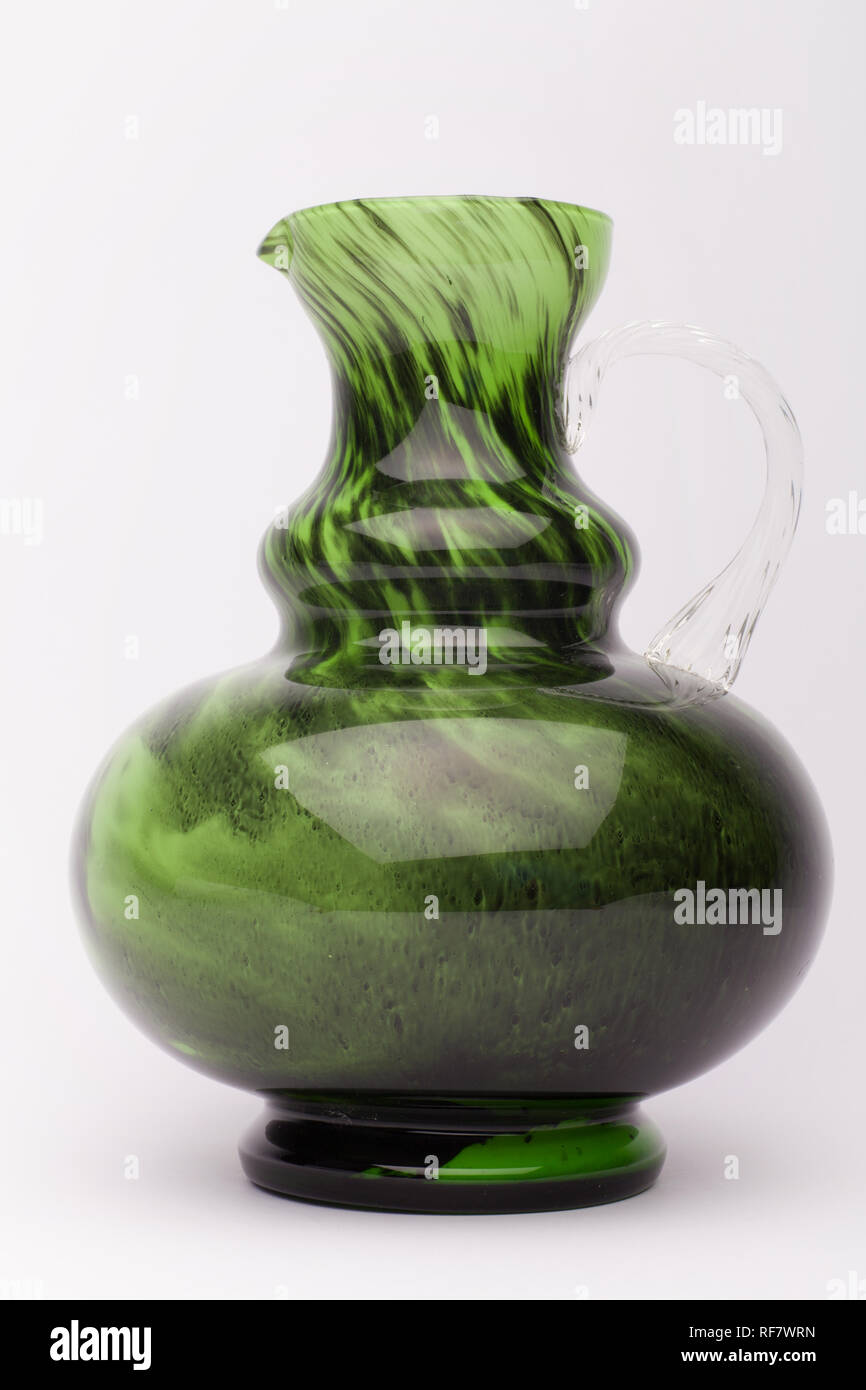 Old green vase on the white background, isolated Stock Photo - Alamy