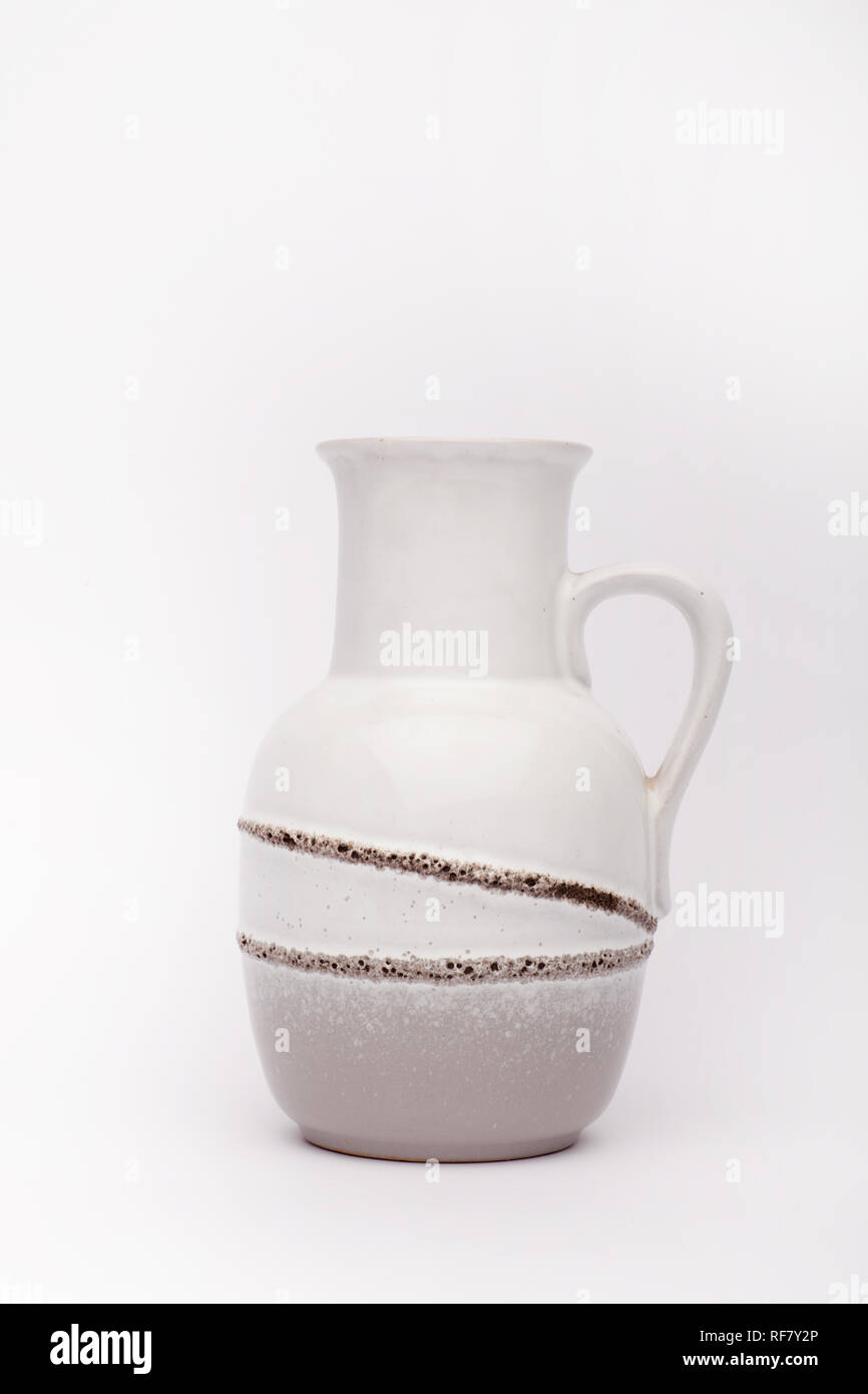 Old white vase on the white background, isolated Stock Photo - Alamy
