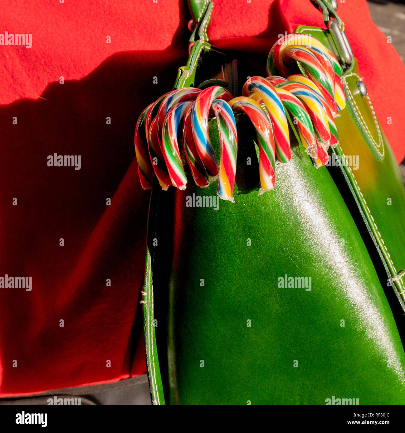 Candy cane at christmas in a purse during the holdiays New York City