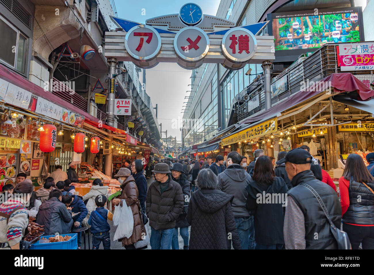 Ameyoko or Ameyayokocho market near Ueno station. One of main shopping street in Tokyo. Text advertise market name and vendor shops including watches Stock Photo