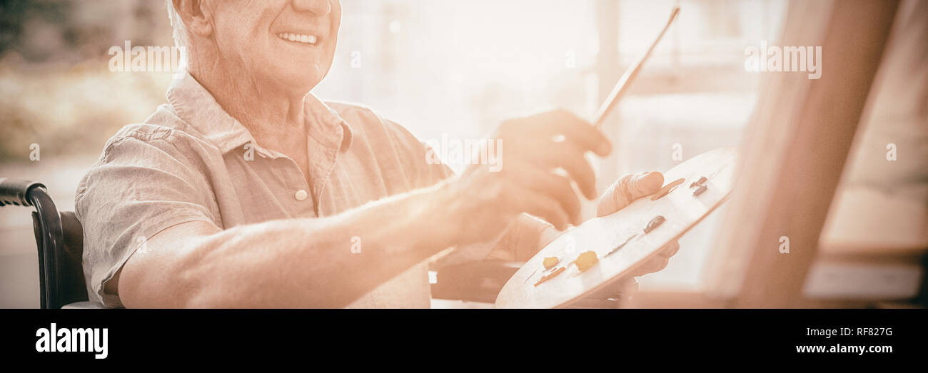 Senior painting hi-res stock photography and images - Alamy