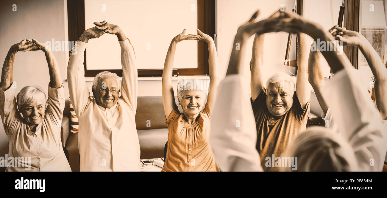 Seniors doing exercises Stock Photo