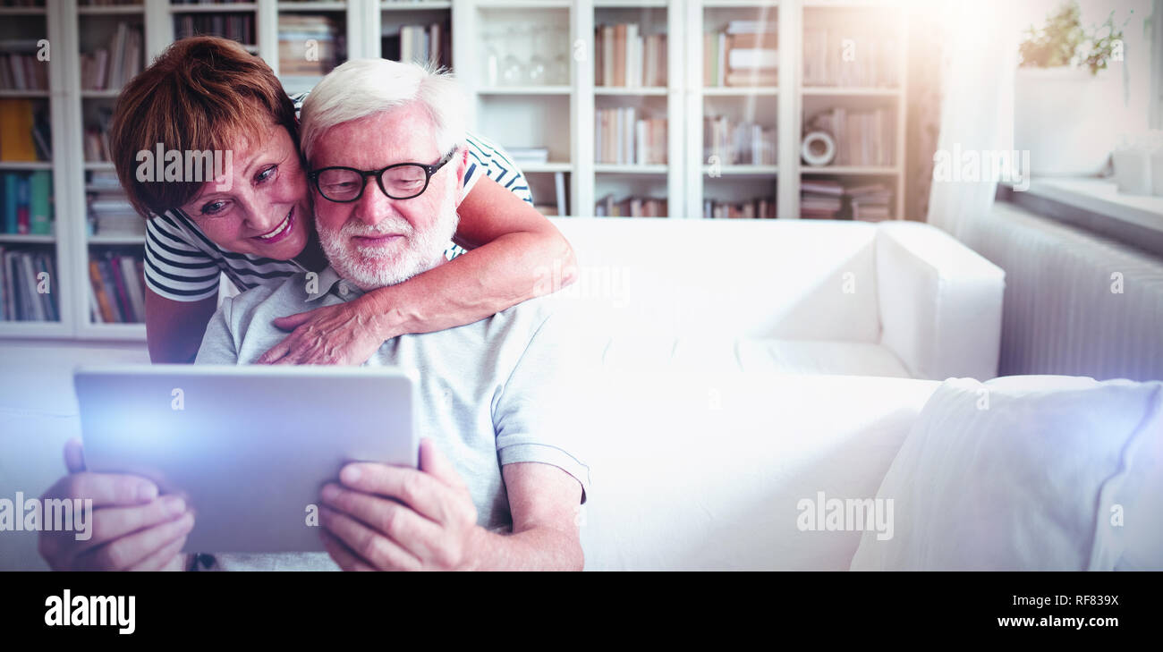 Senior couple using digital tablet Stock Photo