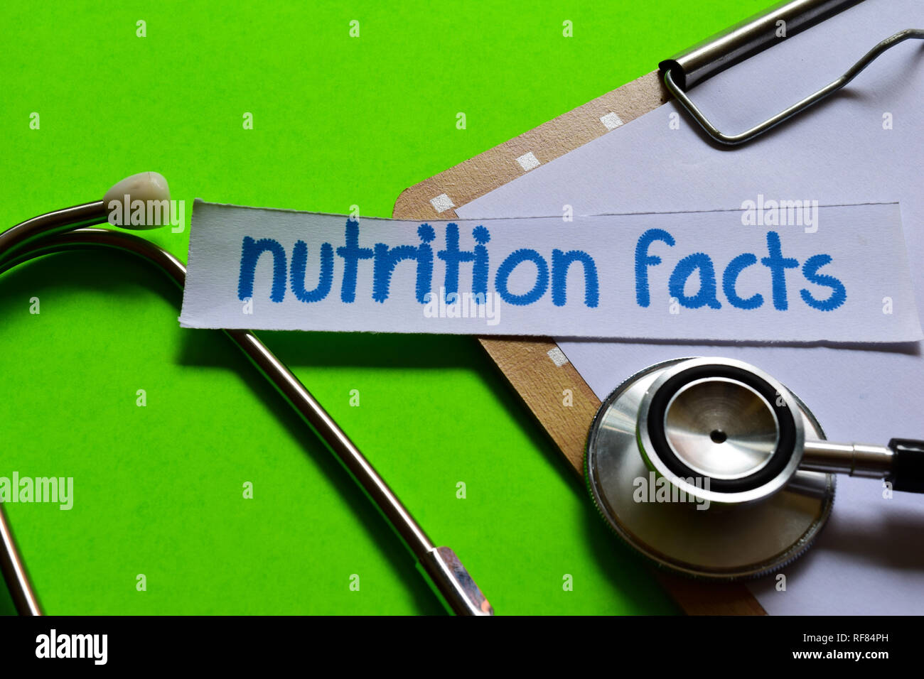 Nutrition facts on healthcare concept inspiration with green background Stock Photo