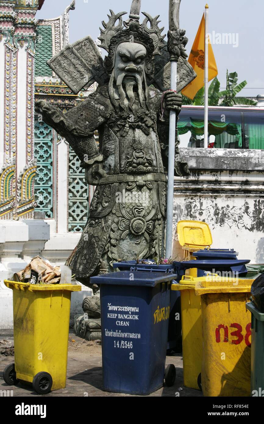 THA Thailand Bangkok Wat Pho Temple. guardian demon wast bins. | Stock Photo
