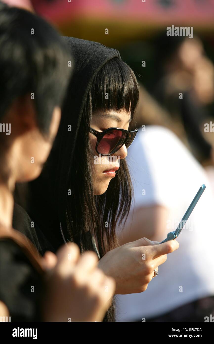 Female mobile phone user, Tokyo, Japan, Asia Stock Photo - Alamy