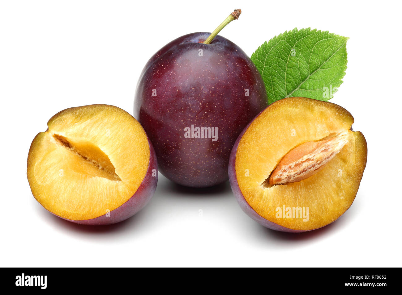 Damson plums with leaves isolated on white background Stock Photo Alamy