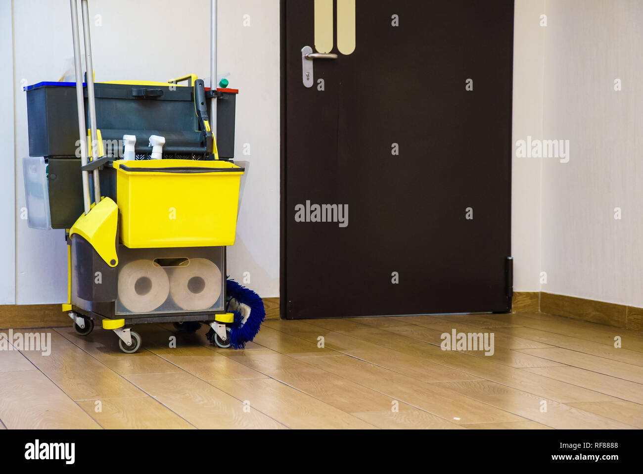 Professional cleaning equipment in corridor. Miscellaneous tools and