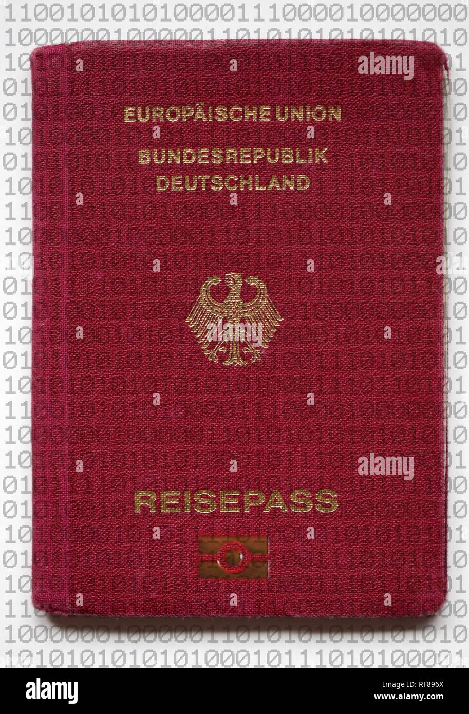 Symbolic photo: new German passport featuring advanced security features, digitalized data and fingerprints Stock Photo