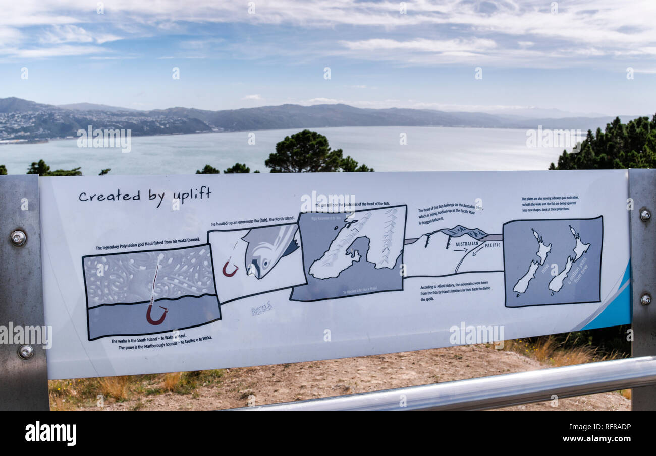 An interpretive sign and views of New Zealand's capital city Wellington from Mt Victoria lookout, on a warm autumn day. Stock Photo
