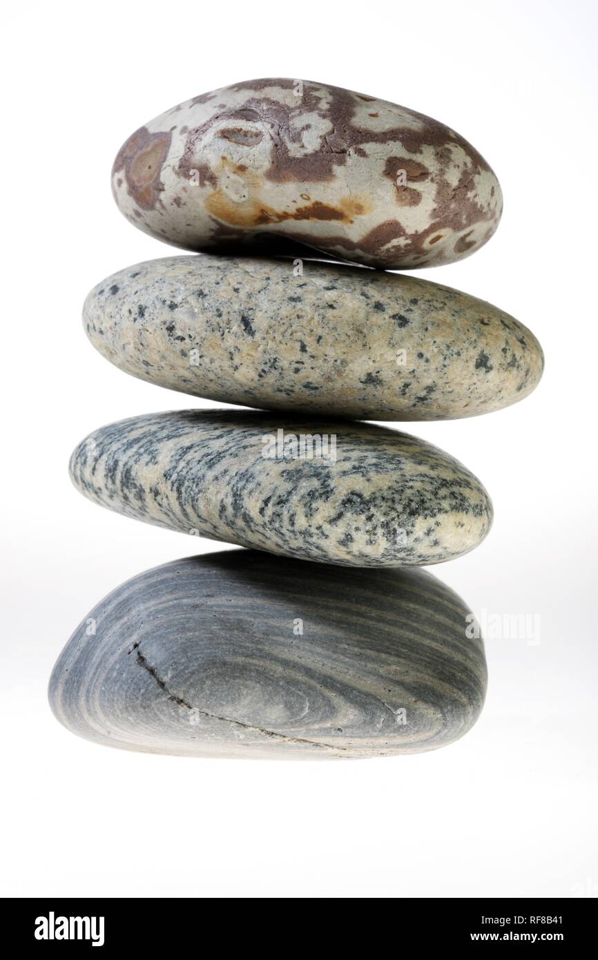 Studio still-life: stacked pebbles, stones Stock Photo - Alamy