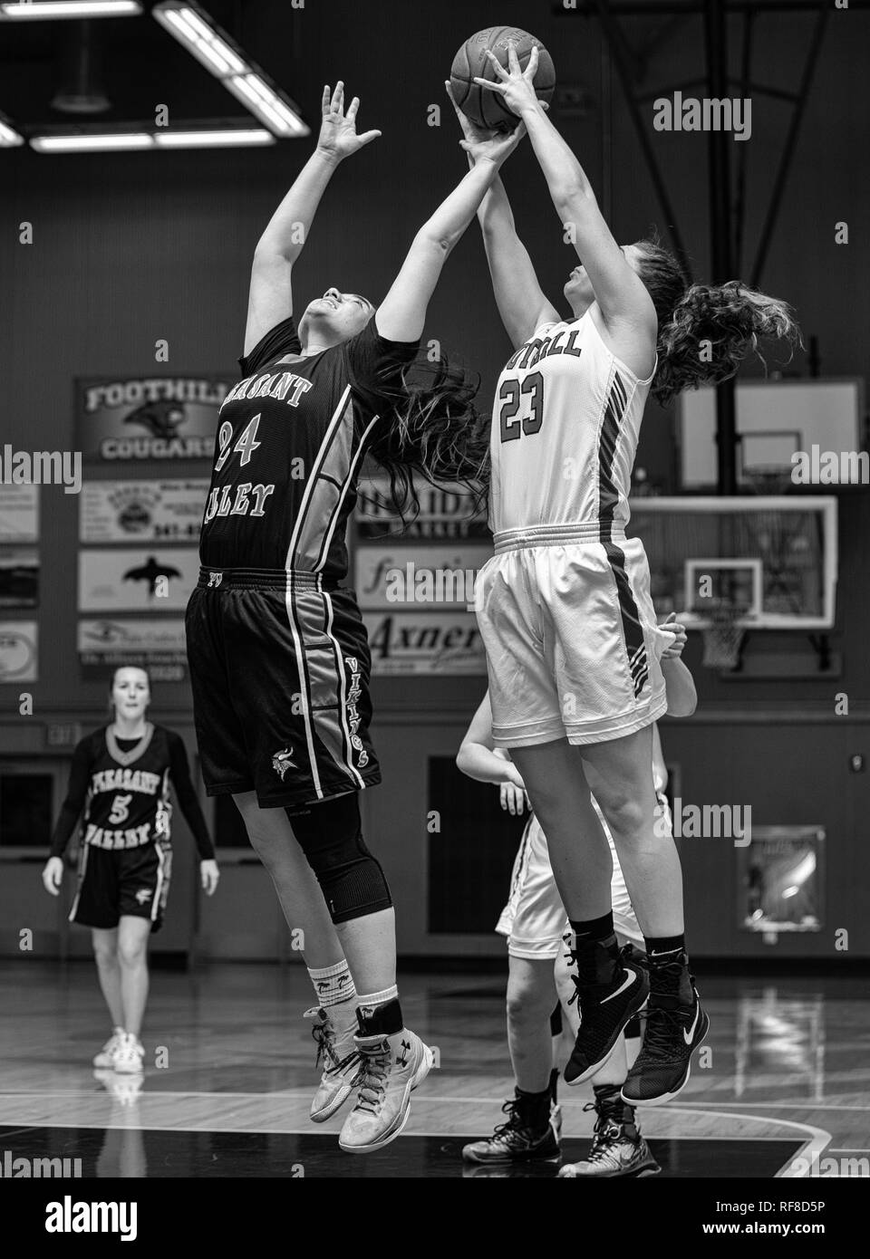 Basketball action with Pleasant Valley vs. Foothill High School in Palo