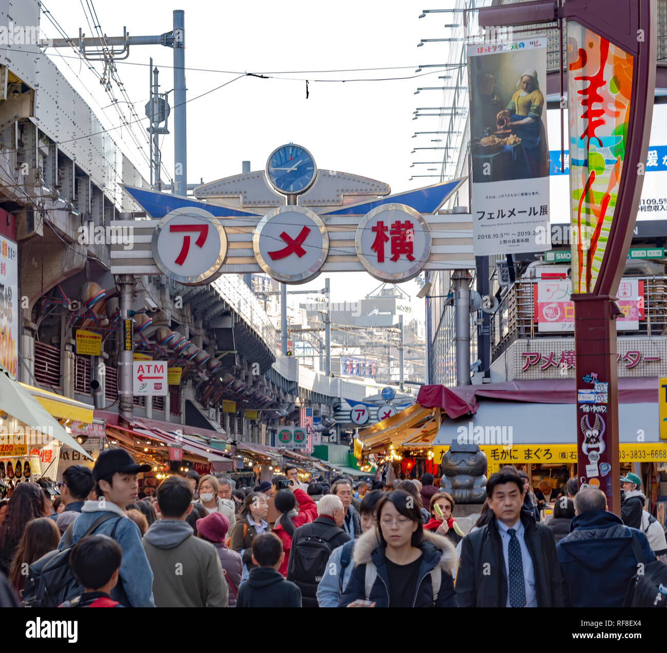 Ameyoko or Ameyayokocho market near Ueno station. One of main shopping street in Tokyo. Text advertise market name and vendor shops including watches Stock Photo