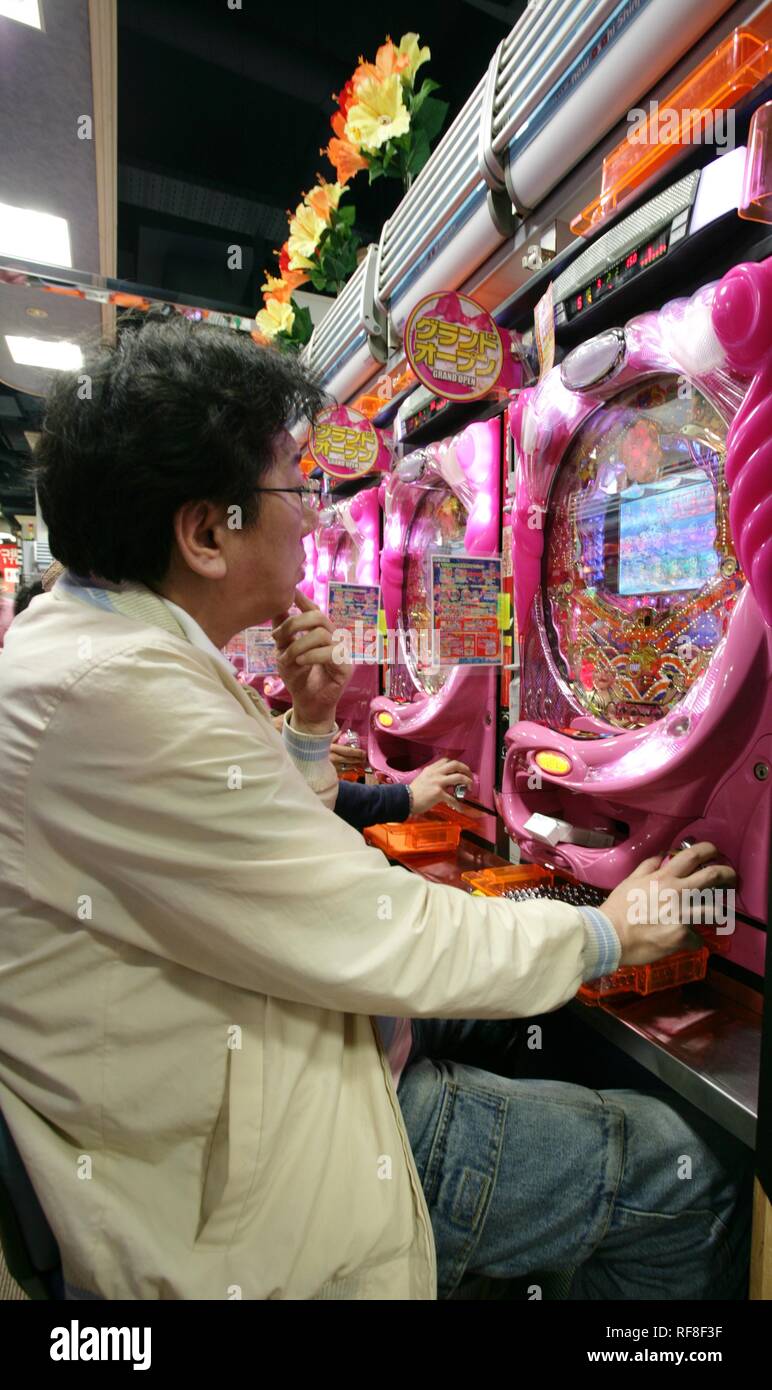 Japan, Tokyo: Pachinko game arcade, a kind of vertical pinball game. Stock Photo