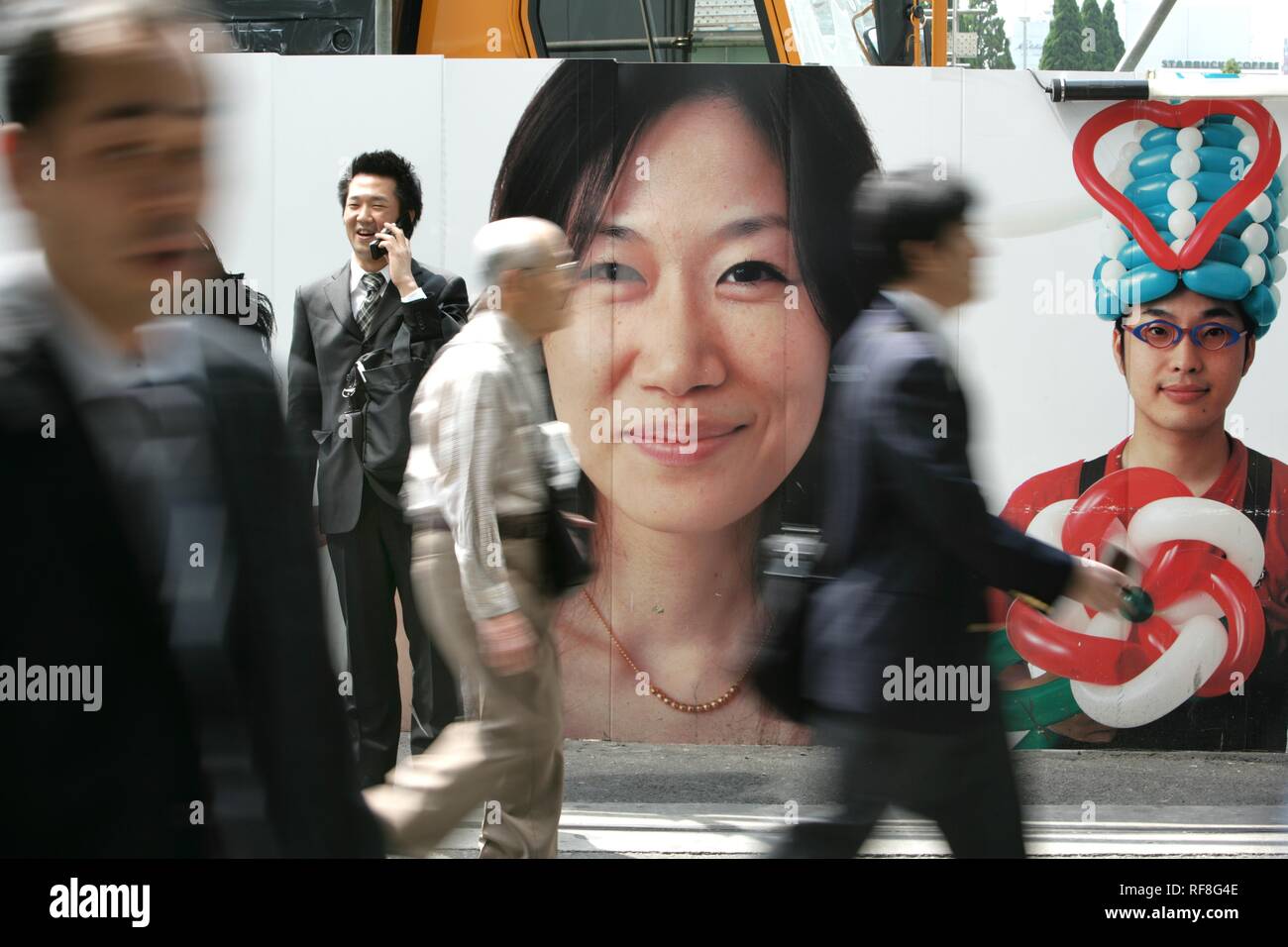 Street scene featuring billboards, Shinjuku district, Tokyo, Japan, Asia Stock Photo