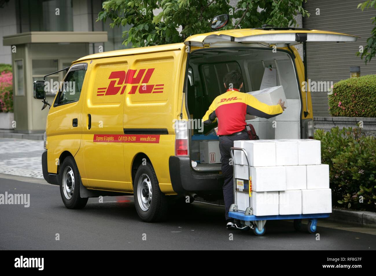 DHL courier service in the Nihombashi financial district, Tokyo, Japan