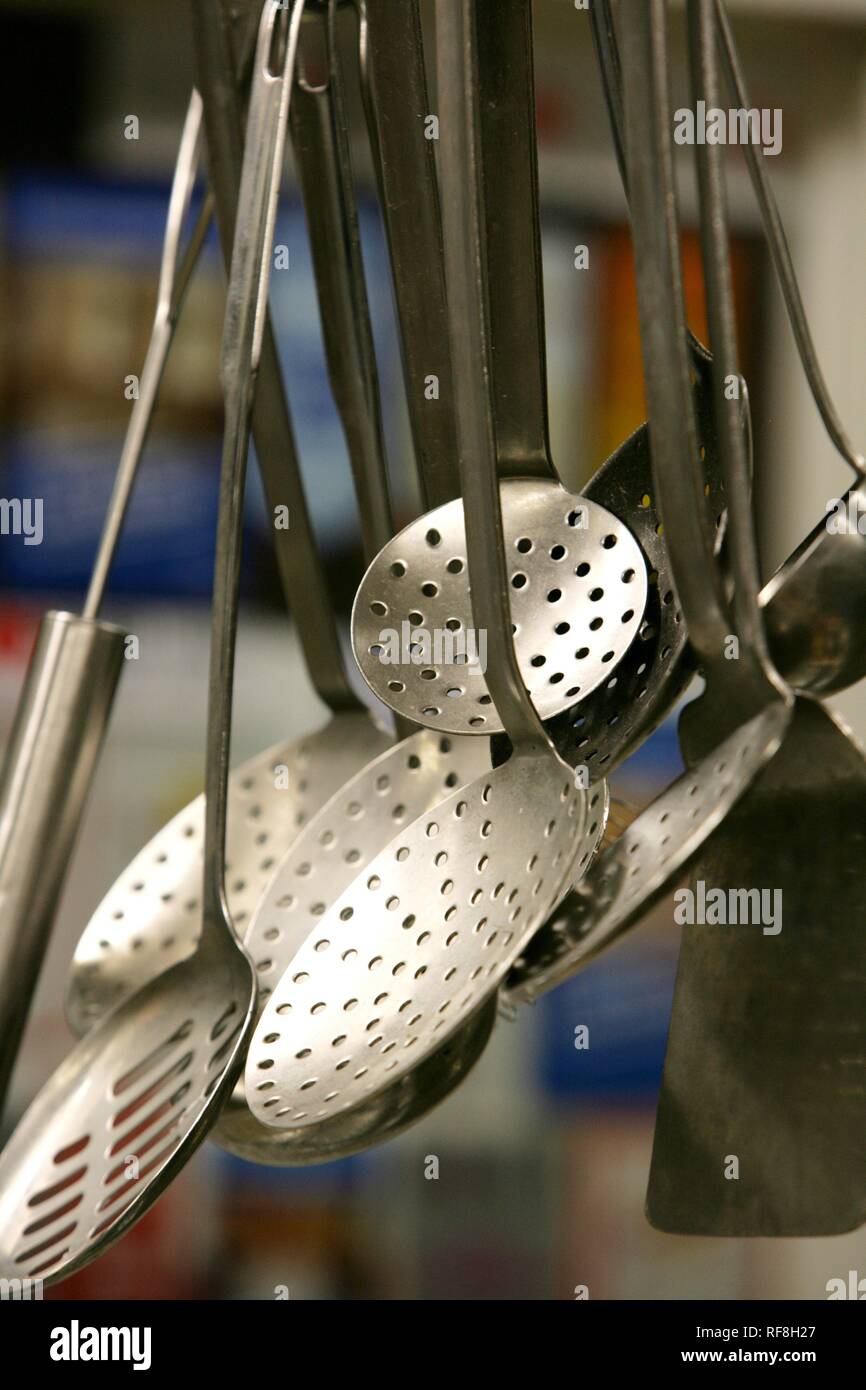 Kitchen utensils at a restaurant kitchen in Germany, Europe Stock Photo