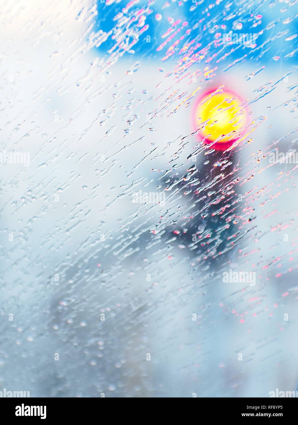 Rain on windshield and blurry lights background Stock Photo Alamy