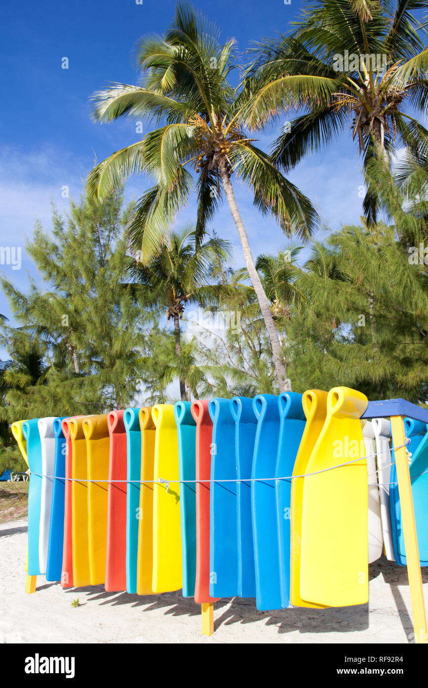The colorful beach equipment on uninhabited island Little Stirrup Cay