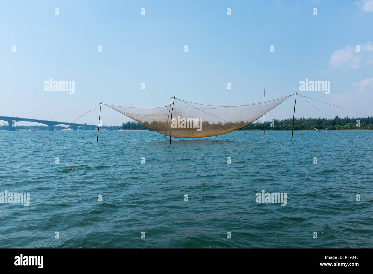 Fishing nets hanging above the water on the Thu Bon River near Hoi An, Vietnam Stock Photo Alamy