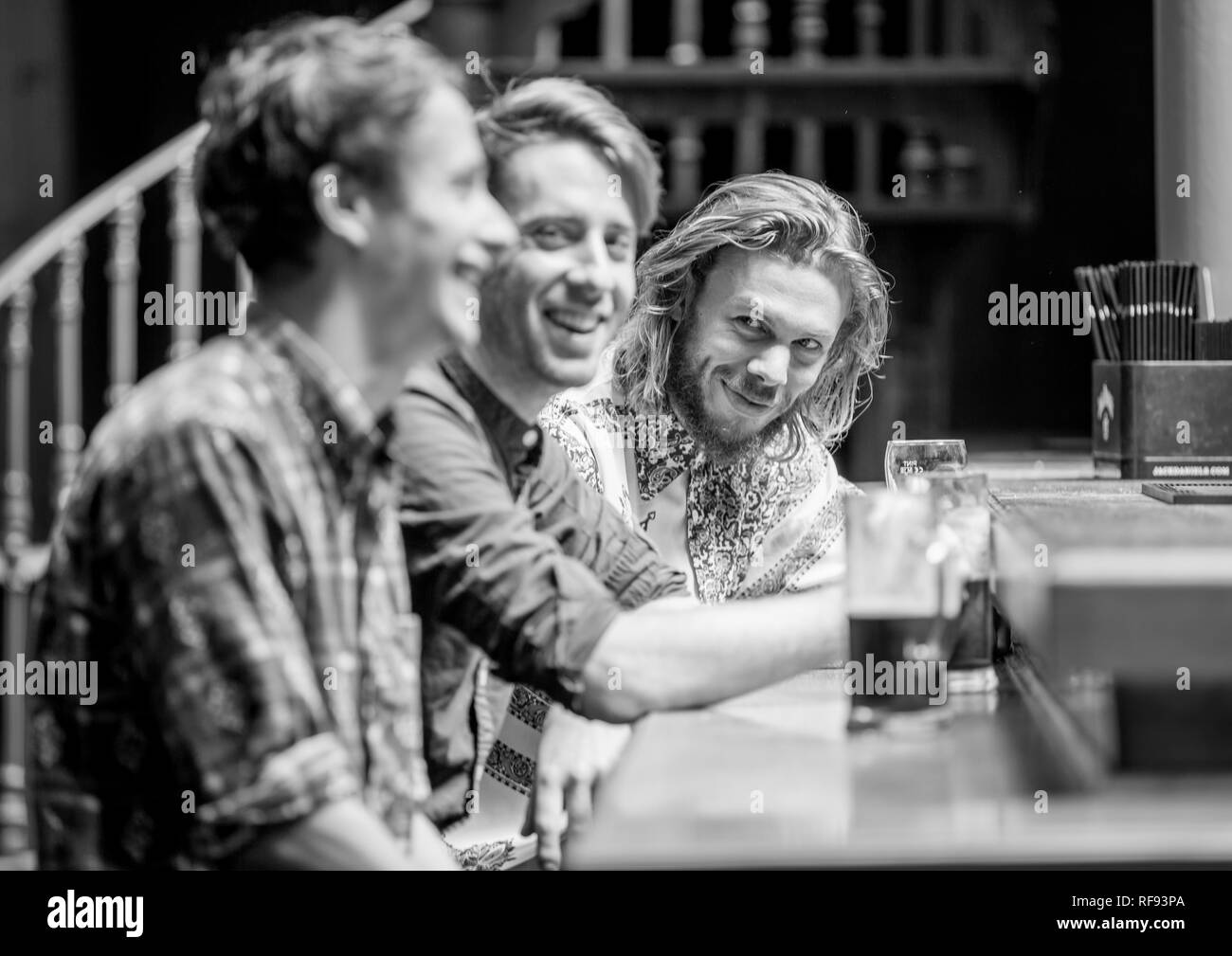 London, England, 13, September 2017, three young men at a bar or pub drinking a beer - newly opened worlds end pub - in Camden, London. Stock Photo