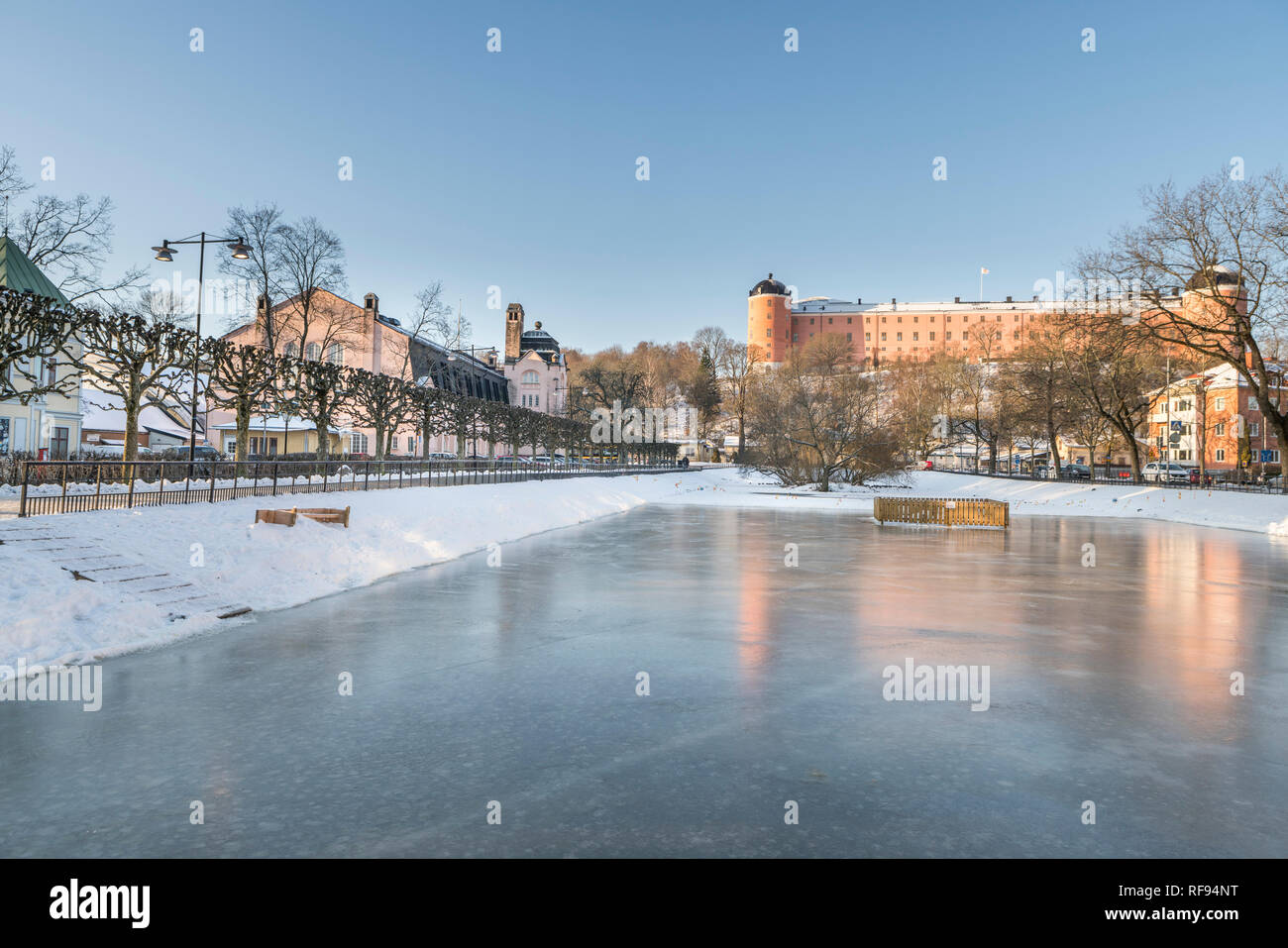 Ice for skating at. Svandammen, with the Castle in the background. Uppsala, Sweden, Scandinavia. Stock Photo