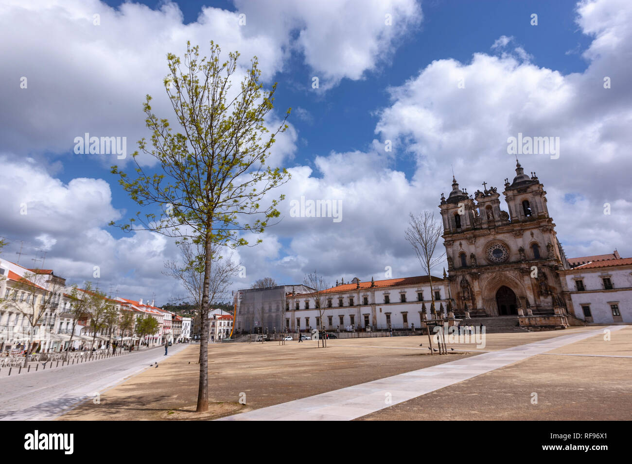 Façade of the Monastery of Alcobaça. The portal and rose window are original gothic, while the towers are baroque. Portugal Stock Photo