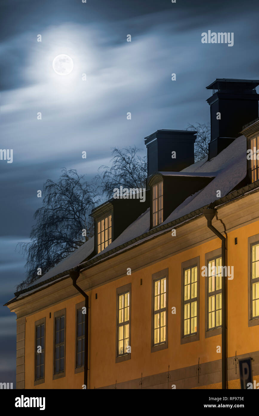 Full moon and old buildings in Central Uppsala, Sweden, Scandinavia. Stock Photo