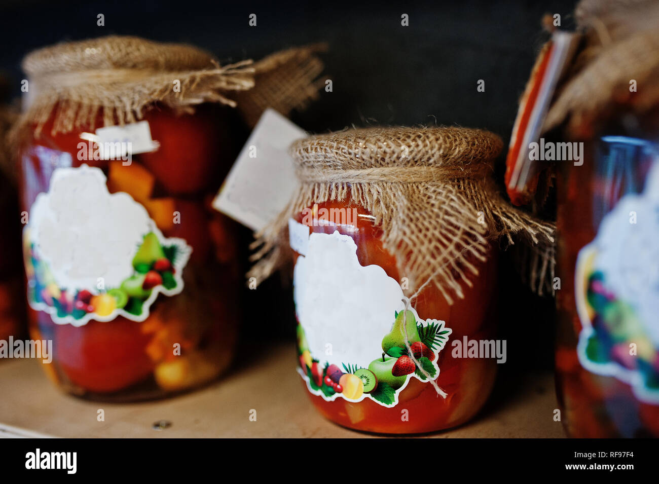 Glass jars of a supermarket shelves or grocery store. Homemade canning