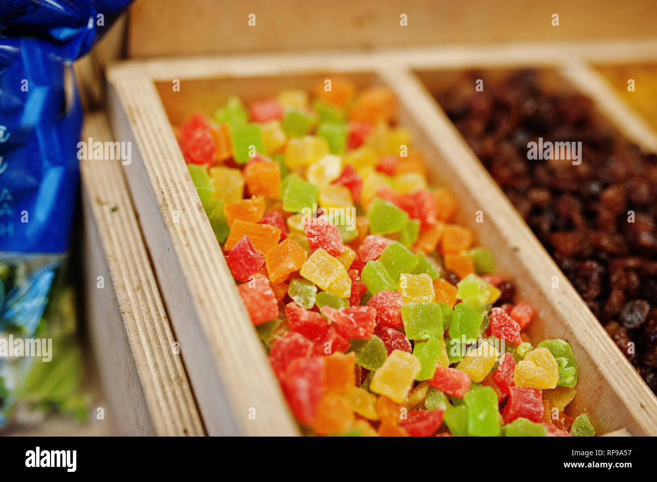 Raisins and candied fruits on the shelf of a supermarket or grocery store. Stock Photo